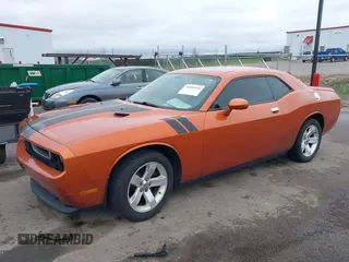 2011 Dodge Challenger with VIN 2B3CJ4DG0BH511006, listed as a IAAI auction lot 39189464 with 148,139 mi miles. Bid and sale history available at carsss.com. Image 2.