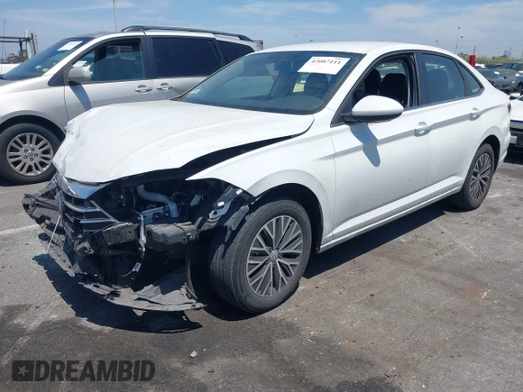 2021 Volkswagen Jetta S z VIN 3VWC57BU4MM037088, wystawiony jako IAAI lot #42087111 z przebiegiem 82 728 mil mil oraz . Historia ofert i sprzedaży dostępna na DreamBid. Obrazek 2.