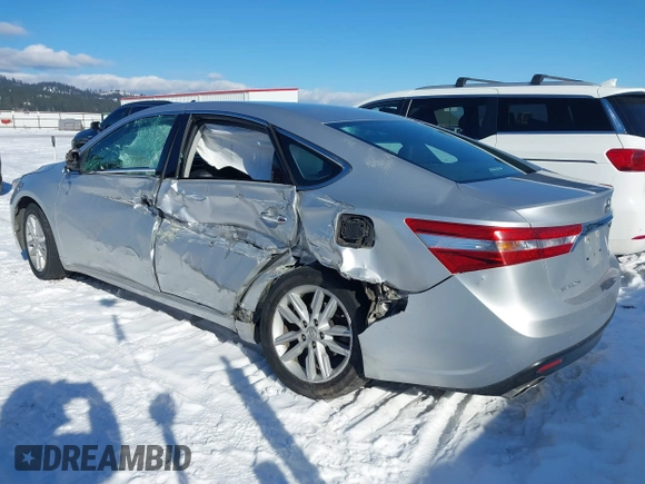2013 Toyota Avalon XLE with VIN 4T1BK1EBXDU009947, listed as a IAAI auction lot 41562857 with 174,764 mi miles and . Bid and sale history available at DreamBid. Image 3.