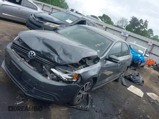 2014 Volkswagen Jetta SE z VIN 3VWD17AJ9EM298175, wystawiony jako IAAI lot #42084756 z przebiegiem 93 039 mil mil oraz . Historia ofert i sprzedaży dostępna na DreamBid. Obrazek 2.