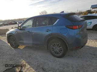 2020 Mazda CX-5 Touring with VIN JM3KFBCM9L0737243, listed as a Copart auction lot 46908495 with 76,956 mi miles and Salvage Title. Bid and sale history available at carsss.com. Image 2.