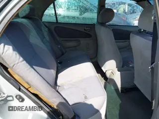 1999 Toyota Corolla VE z VIN 1NXBR12E5XZ237045, wystawiony jako IAAI lot #42413586 z przebiegiem Nie podano mil oraz . Historia ofert i sprzedaży dostępna na DreamBid. Obrazek 8.