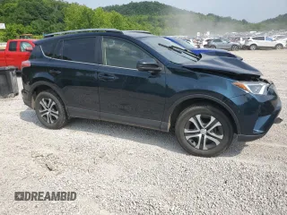 2018 Toyota RAV4 LE with VIN JTMBFREV7JJ253067, listed as a Copart auction lot 60596735 with Not provided miles and Salvage title. Bid and sale history available at DreamBid. Image 4.