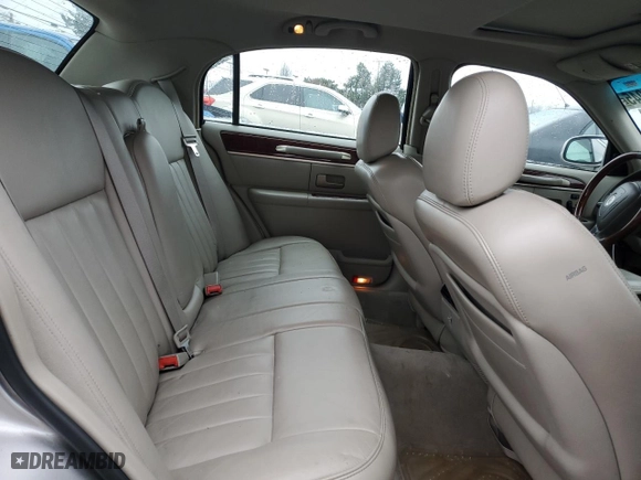 2003 Lincoln Town Car Signature with VIN 1LNHM82W63Y634731, listed as a Copart auction lot 44557045 with 145,541 mi miles and Salvage Title. Bid and sale history available at carsss.com. Image 10.
