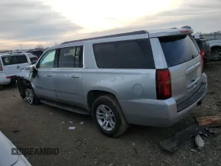 2018 Chevrolet Suburban LT with VIN 1GNSCHKCXJR332103, listed as a Copart auction lot 82861393 with 143,607 mi miles and . Bid and sale history available at DreamBid. Image 2.