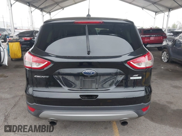 2015 Ford Escape SE with VIN 1FMCU0GXXFUC80317, listed as a IAAI auction lot 42047476 with 230,381 mi miles and . Bid and sale history available at DreamBid. Image 15.