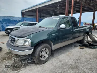 2001 Ford F-150 XL with VIN 1FTRX17L51NA83857, listed as a Copart auction lot 62759145 with 215,961 mi miles and Salvage title. Bid and sale history available at DreamBid. Image 1.