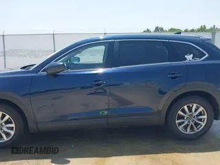 2018 Mazda CX-9 Touring with VIN JM3TCBCY3J0220372, listed as a IAAI auction lot 42405192 with 104,556 mi miles and . Bid and sale history available at DreamBid. Image 14.