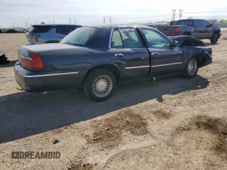 1999 Mercury Grand Marquis LS z VIN 2MEFM75W1XX635839, wystawiony jako Copart lot #55860735 z przebiegiem 114 963 mil mil oraz Szkody całkowita. Historia ofert i sprzedaży dostępna na DreamBid. Obrazek 3.