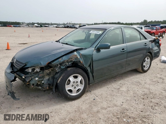 2003 Toyota Camry LE z VIN 4T1BF32K13U554339, wystawiony jako Copart lot #55972595 z przebiegiem 69 549 mil mil oraz Szkoda całkowita • Salvage title. Historia ofert i sprzedaży dostępna na DreamBid. Obrazek 1.