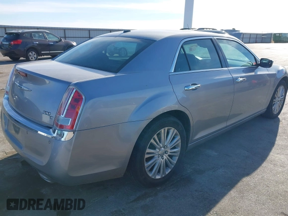 2014 Chrysler 300 C with VIN 2C3CCAKG3EH212936, listed as a IAAI auction lot 40921649 with 153,000 mi miles and . Bid and sale history available at carsss.com. Image 4.