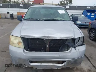 2008 Ford F-150 STX with VIN 1FTRX12W98FC22975, listed as a IAAI auction lot 41957898 with 256,482 mi miles and . Bid and sale history available at carsss.com. Image 6.