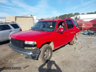 2002 Chevrolet Tahoe LT with VIN 1GNEK13Z12J283366, listed as a IAAI auction lot 41832833 with 350,411 mi miles. Bid and sale history available at carsss.com. Image 2.