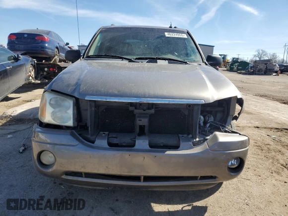 2005 GMC Envoy SLE z VIN 1GKDT13SX52364812, wystawiony jako Copart lot #46224955 z przebiegiem 183 441 mil mil oraz Szkoda całkowita • Salvage title. Historia ofert i sprzedaży dostępna na DreamBid. Obrazek 5.
