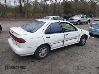 1996 Nissan Sentra XE z VIN 1N4AB41D0TC763104, wystawiony jako IAAI lot #41303640 z przebiegiem 307 682 mil mil oraz . Historia ofert i sprzedaży dostępna na DreamBid. Obrazek 4.