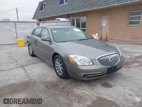2011 Buick Lucerne CXL Premium with VIN 1G4HJ5EM0BU104715, listed as a IAAI auction lot 41706751 with 123,636 mi miles. Bid and sale history available at carsss.com. Image 1.