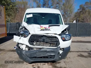 2018 Ford Transit with VIN 1FTYR1CM2JKB28906, listed as a IAAI auction lot 40822222 with 130,094 mi miles and . Bid and sale history available at DreamBid. Image 11.