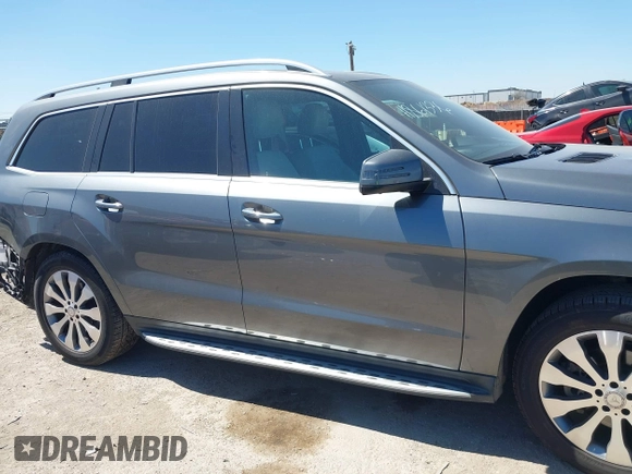 2017 Mercedes-Benz GLS 450 z VIN 4JGDF6EE9HA829030, wystawiony jako IAAI lot #41861336 z przebiegiem 107 836 mil mil oraz . Historia ofert i sprzedaży dostępna na DreamBid. Obrazek 13.