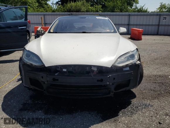 2013 Tesla Model S z VIN 5YJSA1DN0DFP18592, wystawiony jako Copart lot #62151505 z przebiegiem 192 283 mil mil oraz Szkoda całkowita • Salvage title. Historia ofert i sprzedaży dostępna na DreamBid. Obrazek 5.