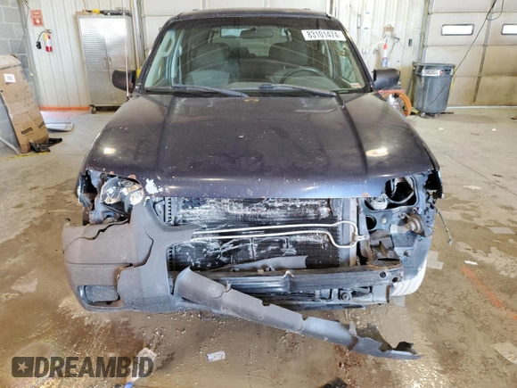 2004 Ford Escape XLS with VIN 1FMYU92154KA14600, listed as a Copart auction lot 83101474 with 305,444 mi miles and Salvage Title. Bid and sale history available at DreamBid. Image 5.