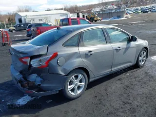2013 Ford Focus SE with VIN 1FADP3F24DL288221, listed as a IAAI auction lot 41646815 with 169,617 mi miles. Bid and sale history available at carsss.com. Image 4.