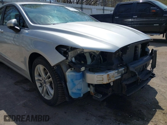 2018 Ford Fusion SE z VIN 3FA6P0H77JR226390, wystawiony jako IAAI lot #42120981 z przebiegiem 114 057 mil mil oraz . Historia ofert i sprzedaży dostępna na DreamBid. Obrazek 19.
