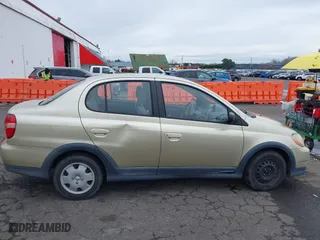 2001 Toyota ECHO with VIN JTDBT123610159121, listed as a IAAI auction lot 41766134 with 256,250 mi miles. Bid and sale history available at carsss.com. Image 13.