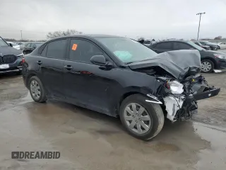 2023 Kia Rio LX with VIN 3KPA24AD7PE616450, listed as a Copart auction lot 84690444 with 28,908 mi miles and Salvage Title. Bid and sale history available at DreamBid. Image 4.