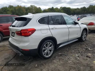 2017 BMW X1 xDrive28i z VIN WBXHT3C35H5F68041, wystawiony jako Copart lot #74858123 z przebiegiem 103 234 mil mil oraz Szkody całkowita. Historia ofert i sprzedaży dostępna na DreamBid. Obrazek 3.