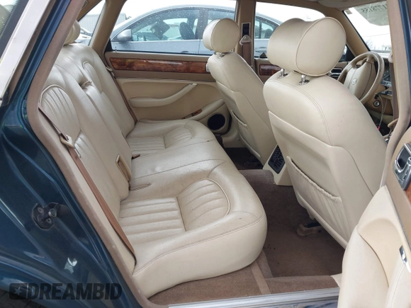 1996 Jaguar XJ with VIN SAJHX1743TC759842, listed as a IAAI auction lot 41778155 with 189,315 mi miles and . Bid and sale history available at DreamBid. Image 8.