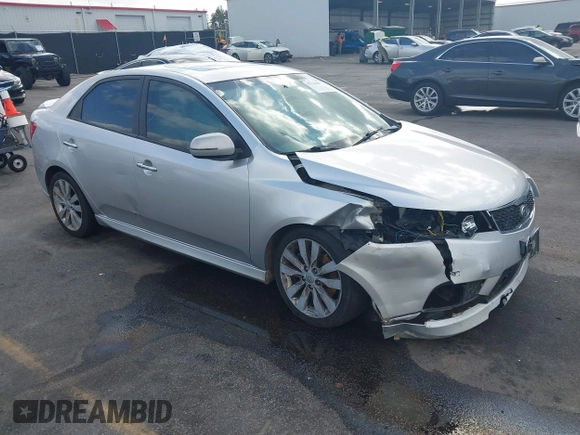 2012 Kia Forte SX with VIN KNAFW4A3XC5589300, listed as a IAAI auction lot 41714687 with 304,477 mi miles. Bid and sale history available at carsss.com. Image 1.