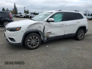 2019 Jeep Cherokee Latitude Plus z VIN 1C4PJLLB5KD373217, wystawiony jako Copart lot #55886695 z przebiegiem 113 631 mil mil oraz Szkoda całkowita • Salvage title. Historia ofert i sprzedaży dostępna na DreamBid. Obrazek 1.