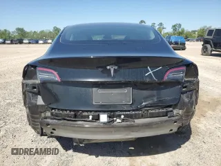 2023 Tesla Model 3 with VIN 5YJ3E1EA1PF456896, listed as a Copart auction lot 50423785 with 49,316 mi miles and Salvage title. Bid and sale history available at DreamBid. Image 6.