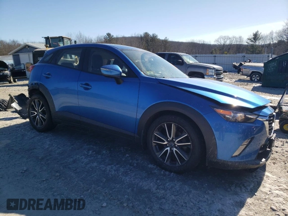 2017 Mazda CX-3 Touring with VIN JM1DKFC71H0149617, listed as a Copart auction lot 43625215 with 71,828 mi miles and Salvage Title. Bid and sale history available at DreamBid. Image 4.