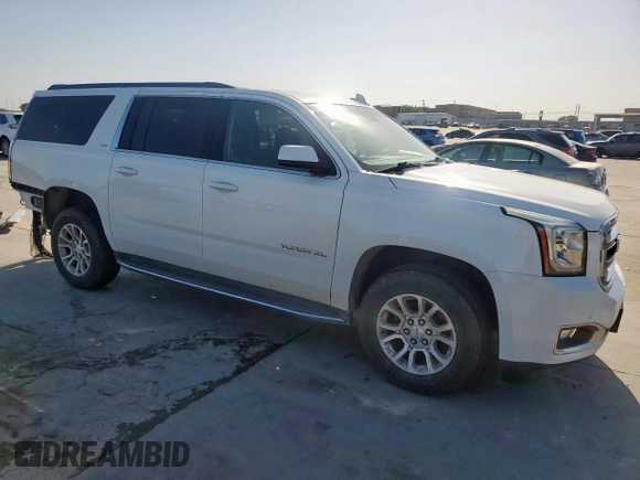 2019 GMC Yukon XL SLT with VIN 1GKS2GKC5KR363643, listed as a Copart auction lot 52749525 with 92,872 mi miles and Salvage title. Bid and sale history available at DreamBid. Image 4.