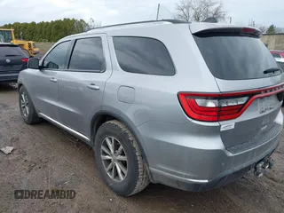 2015 Dodge Durango Limited with VIN 1C4RDJDG2FC907624, listed as a IAAI auction lot 41932086 with 185,104 mi miles and . Bid and sale history available at carsss.com. Image 3.