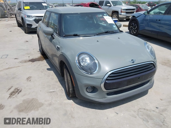 2021 MINI Hardtop 4 Door Oxford Edition with VIN WMWXU7C09M2P17351, listed as a IAAI auction lot 42330197 with 51,628 mi miles and . Bid and sale history available at DreamBid. Image 1.