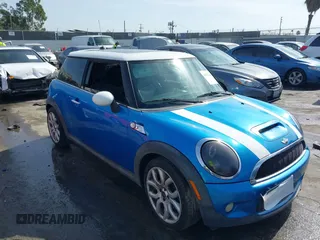 2009 MINI Hardtop S with VIN WMWMF73599TW87617, listed as a IAAI auction lot 41612318 with 86,500 mi miles and . Bid and sale history available at DreamBid. Image 1.