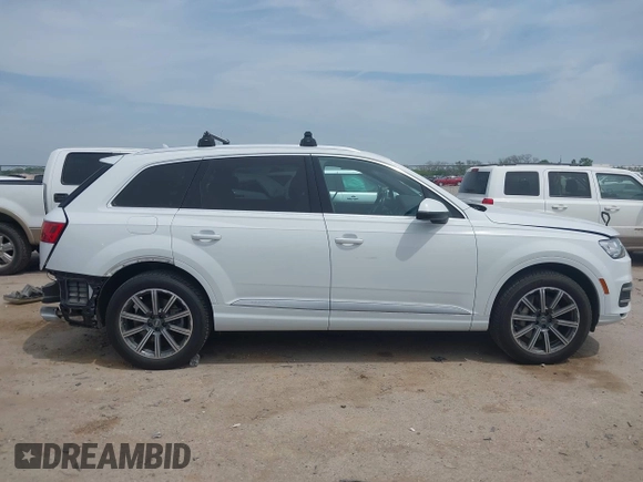 2017 Audi Q7 Premium Plus z VIN WA1LAAF77HD031992, wystawiony jako IAAI lot #42058343 z przebiegiem 99 827 mil mil oraz . Historia ofert i sprzedaży dostępna na DreamBid. Obrazek 14.
