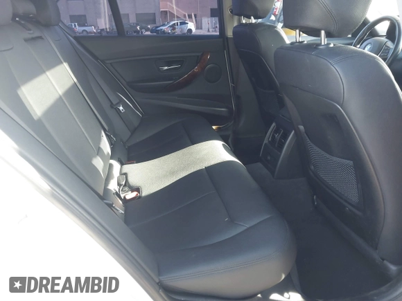 2015 BMW 3 Series 328i with VIN WBA3C1C52FK119339, listed as a IAAI auction lot 41549876 with 148,347 mi miles and . Bid and sale history available at carsss.com. Image 8.