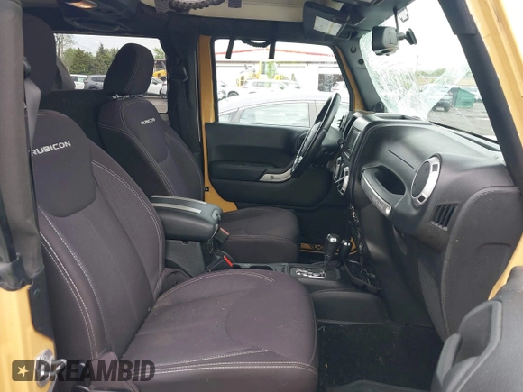 2014 Jeep Wrangler Rubicon with VIN 1C4BJWCG4EL145081, listed as a IAAI auction lot 42180723 with 113,659 mi miles and . Bid and sale history available at DreamBid. Image 5.