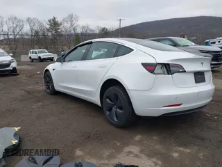 2020 Tesla Model 3 Standard Range Plus with VIN 5YJ3E1EA7LF659172, listed as a IAAI auction lot 42017026 with 32,104 mi miles. Bid and sale history available at carsss.com. Image 3.