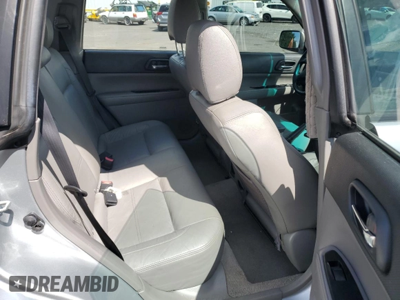 2003 Subaru Forester XS with VIN JF1SG65663H755380, listed as a Copart auction lot 69022344 with 148,658 mi miles and Salvage Title. Bid and sale history available at carsss.com. Image 10.