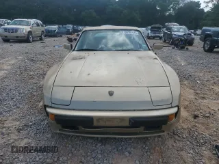 1984 Porsche 944 z VIN WP0AA0940EN458560, wystawiony jako Copart lot #59191935 z przebiegiem 85 420 mil mil oraz Czysty tytuł • Clean title. Historia ofert i sprzedaży dostępna na DreamBid. Obrazek 5.
