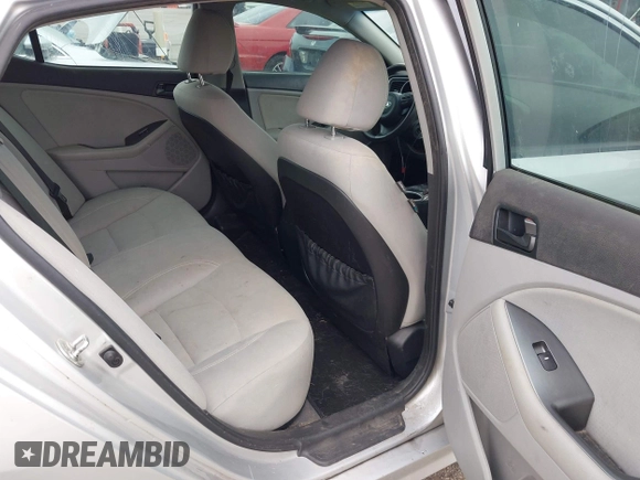 2015 Kia Optima LX with VIN 5XXGM4A72FG360660, listed as a IAAI auction lot 42667514 with 151,317 mi miles and . Bid and sale history available at DreamBid. Image 8.
