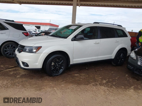 2019 Dodge Journey SE with VIN 3C4PDCBB7KT797842, listed as a IAAI auction lot 42036147 with 163,919 mi miles and . Bid and sale history available at DreamBid. Image 2.