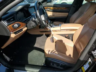 2014 BMW 7 Series 740Li xDrive z VIN WBAYF4C58ED281817, wystawiony jako Copart lot #55755815 z przebiegiem 112 398 mil mil oraz Szkoda całkowita • Salvage title. Historia ofert i sprzedaży dostępna na DreamBid. Obrazek 7.