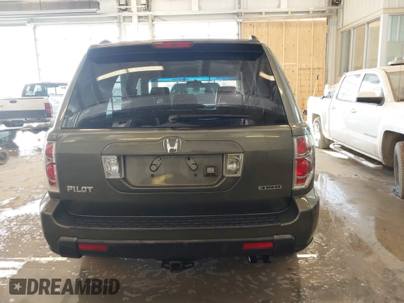2006 Honda Pilot EX-L with VIN 5FNYF187X6B026463, listed as a IAAI auction lot 41612181 with 242,828 mi miles and . Bid and sale history available at DreamBid. Image 16.
