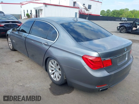 2010 BMW 7 Series 750Li xDrive with VIN WBAKC8C51ACY68317, listed as a IAAI auction lot 42210033 with 124,765 mi miles and . Bid and sale history available at DreamBid. Image 3.