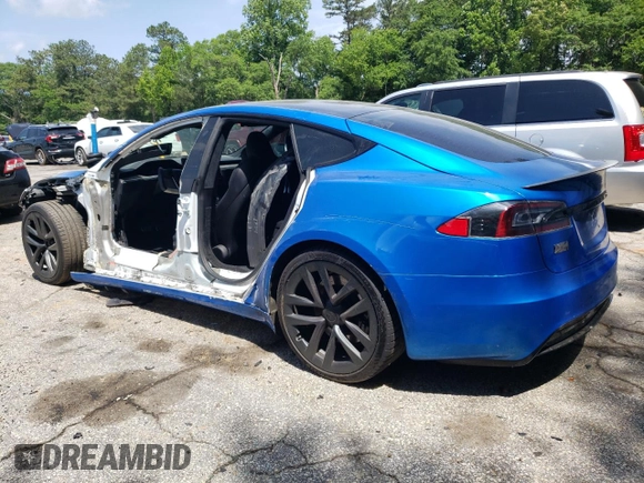 2021 Tesla Model S Plaid with VIN 5YJSA1E64MF438794, listed as a Copart auction lot 56903365 with 63,671 mi miles and Salvage title. Bid and sale history available at DreamBid. Image 2.